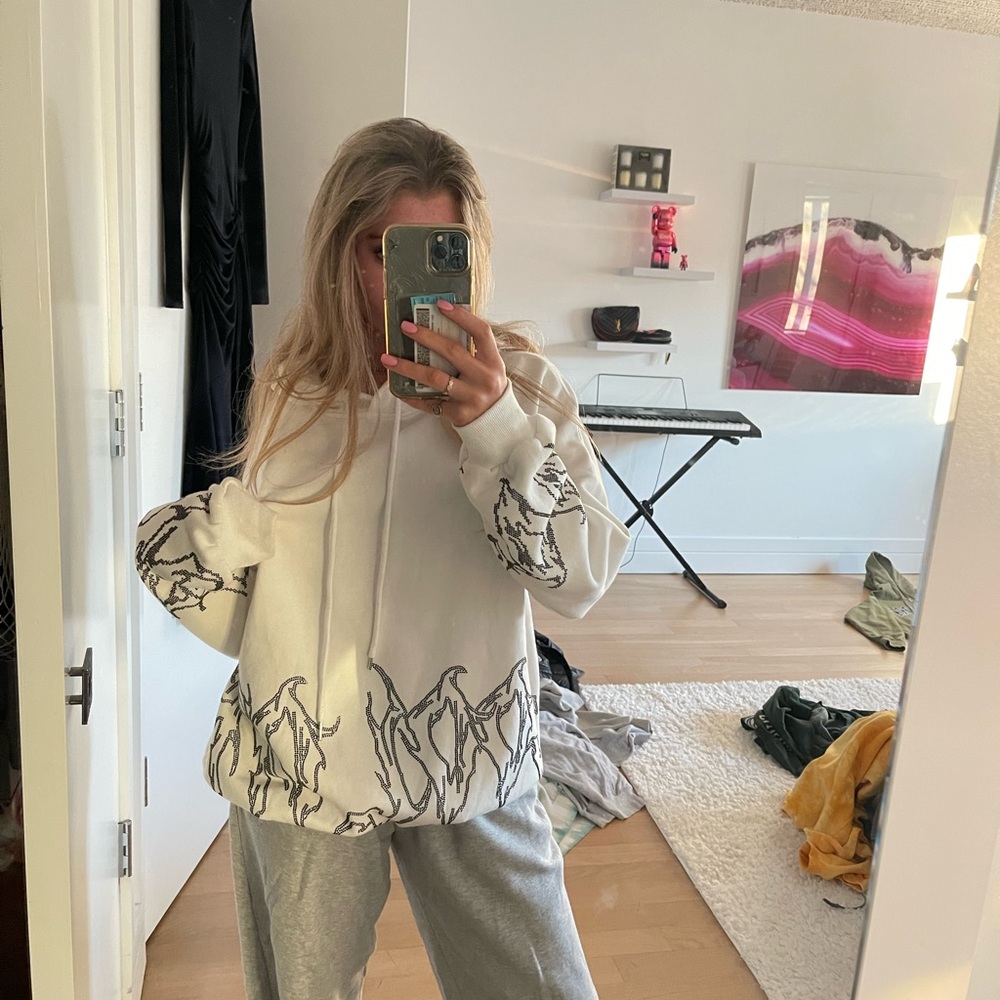 Adika White Hoodie with Black Flame Graphic Design